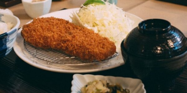 Crispy golden tonkatsu cutlet with rice and miso soup in Tokyo restaurant