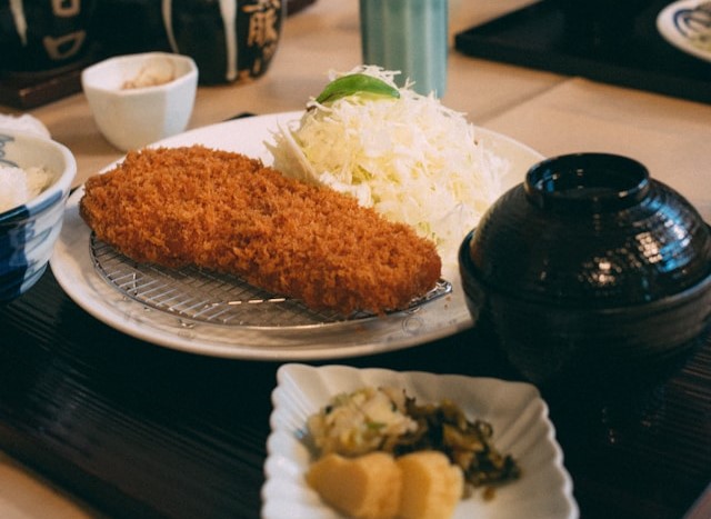 Crispy golden tonkatsu cutlet with rice and miso soup in Tokyo restaurant